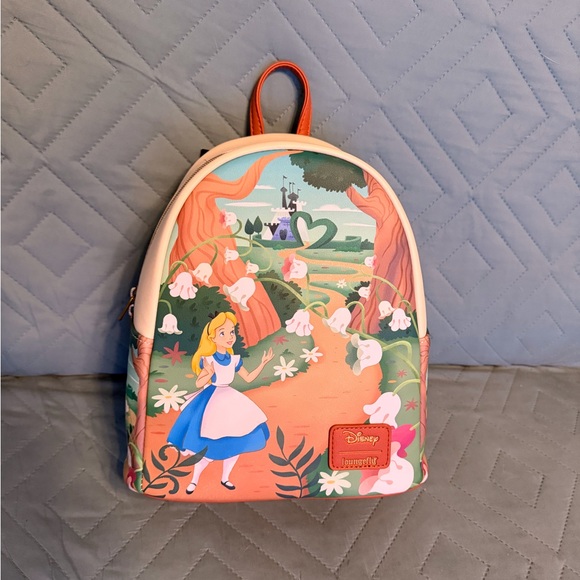 Loungefly Handbags - Loungefly Alice in Wonderland Backpack NWT